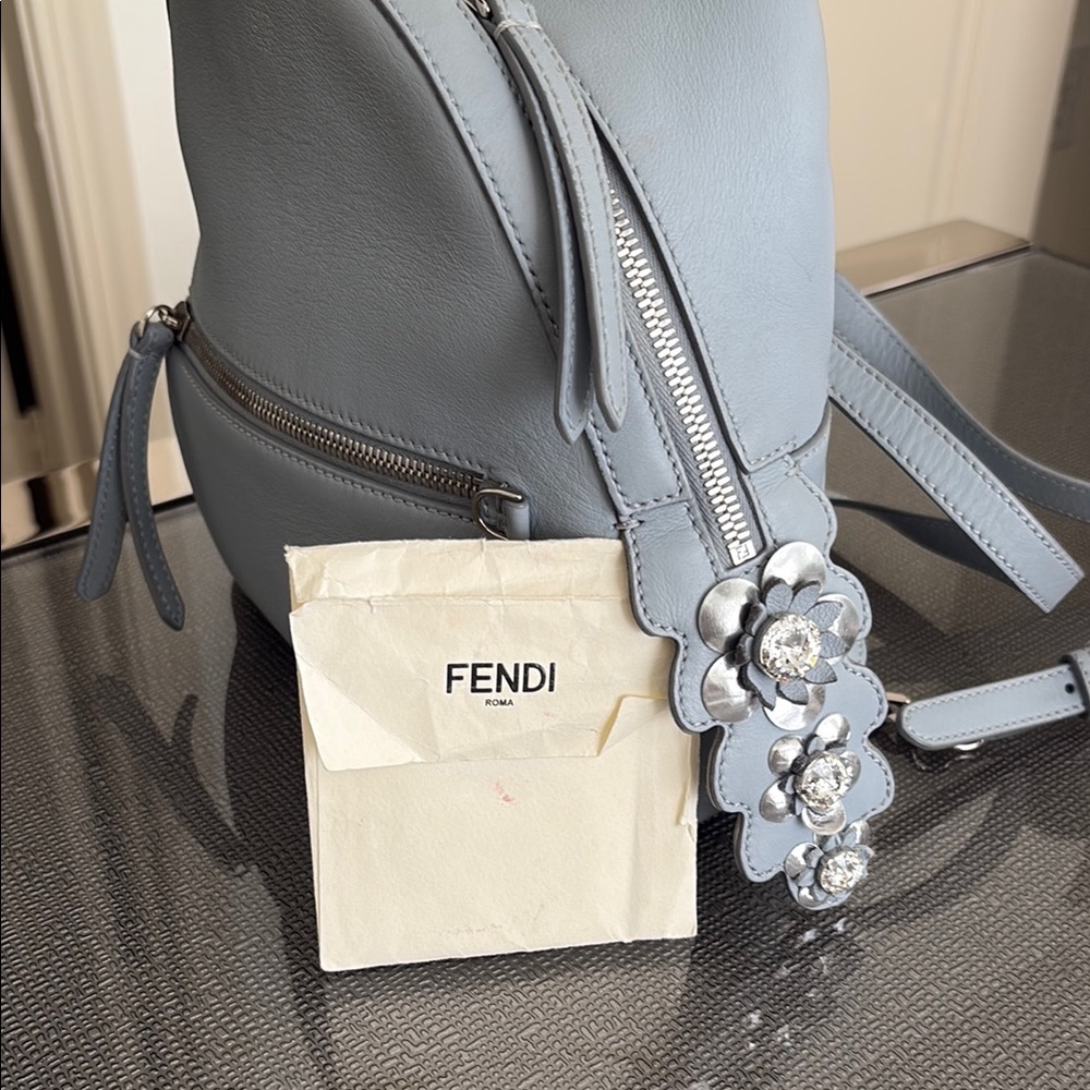Fendi Blue Medium Packpack with sparking accessories.Excellent condition.
